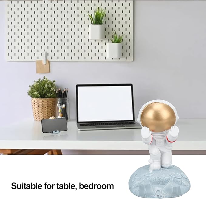 Decorative Astronaut Phone Stand with Gold Helmet on Moon Base – Unique and Functional Desk Accessory